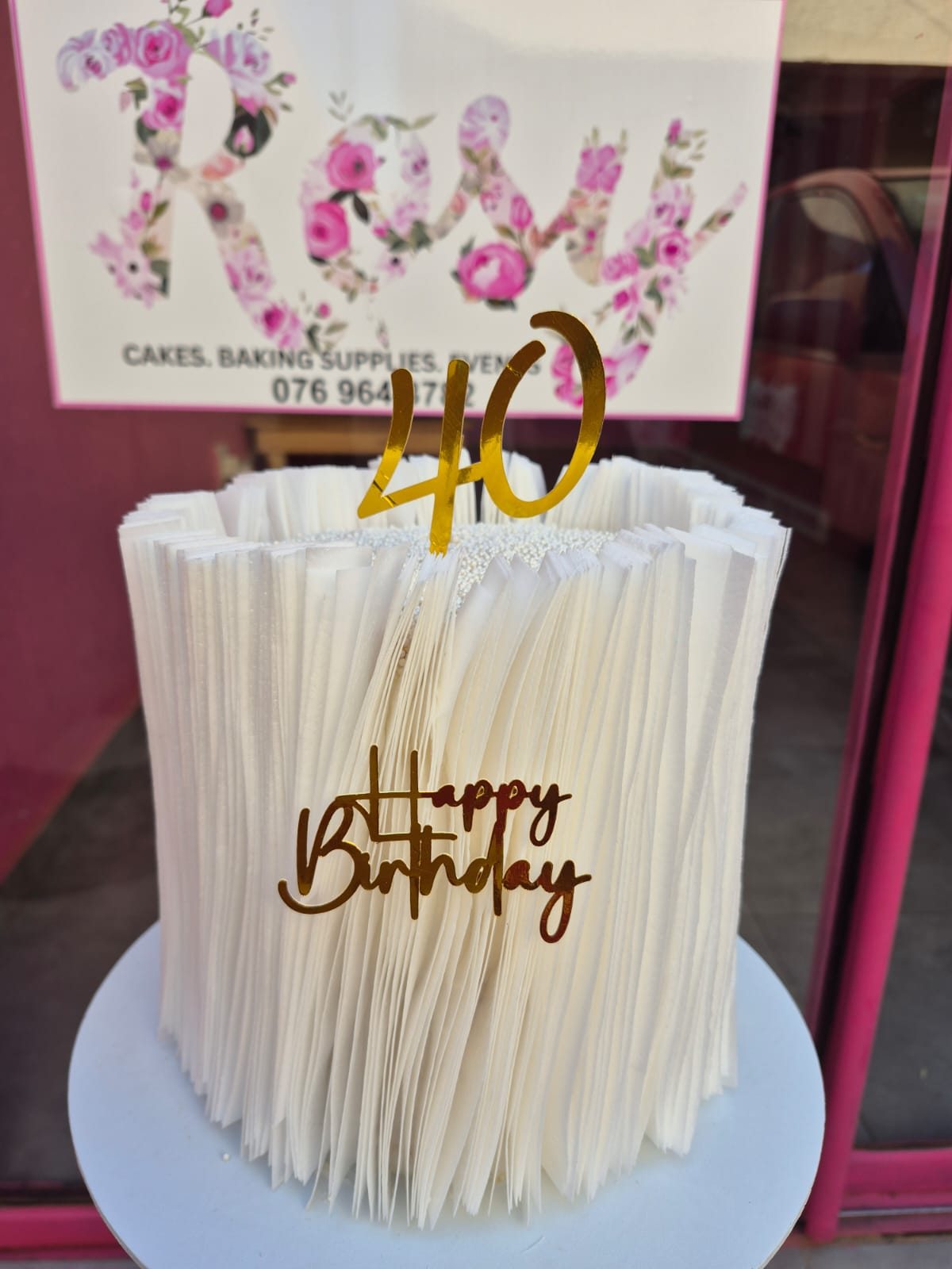 An elegant white fringe fortieth birthday cake made by Rosy's Cakes and Events